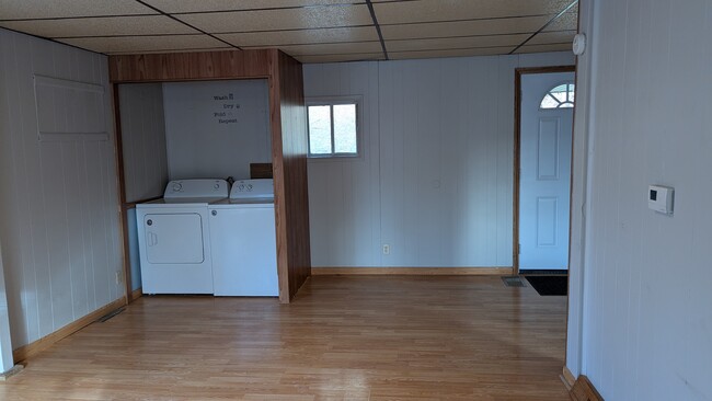 Living room with laundry