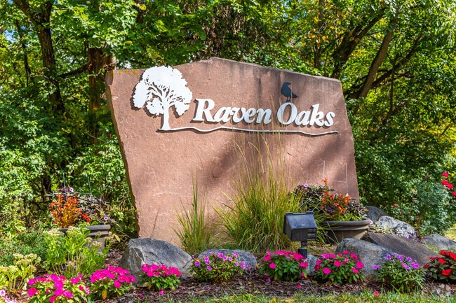 Raven Oaks is surrounded by dense woods, offering a secluded feel near Omaha.