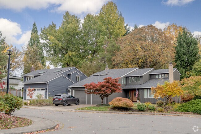 Raleigh Hills offers modern Northwest Contemporary homes set among lush greenery and seasonal color.