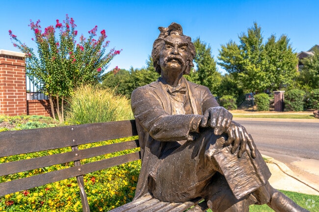 Coffee Creek pays tribute to Mark Twain with a bronze statue for residents to sit by.