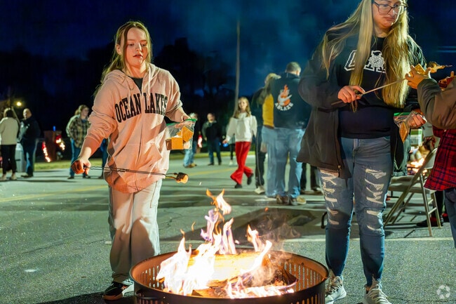 Friends make s’mores during a Bogart fall evening.