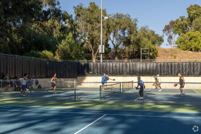 This group of residents are playing pickleball at Thibodo Park in Shadowridge.