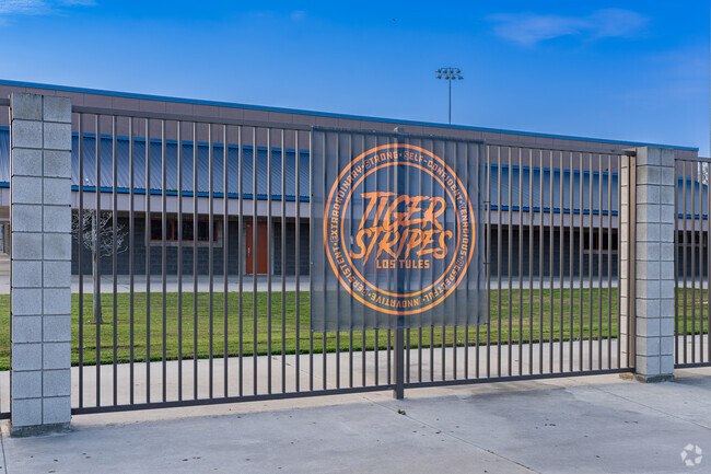 A fence banner encouraged students of Los Tules Middle School in Tulare.