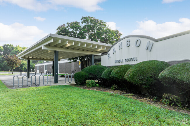 Residents of Double Oaks can attend Ranson Middle School in NC.