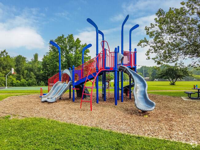 Children love to play on the hockey-themed playscape at Woodward Park.