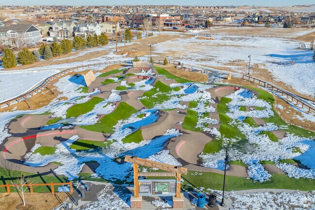 Surrounded by lush green spaces, the park features playgrounds, sports fields, and picnic areas, making it an ideal destination for outdoor activities and community events throughout the year.