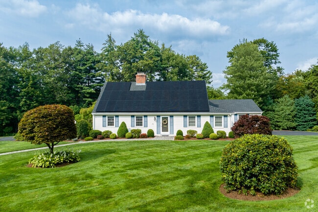This Cape Cod home in Berlin shows off its picture perfect landscaping.