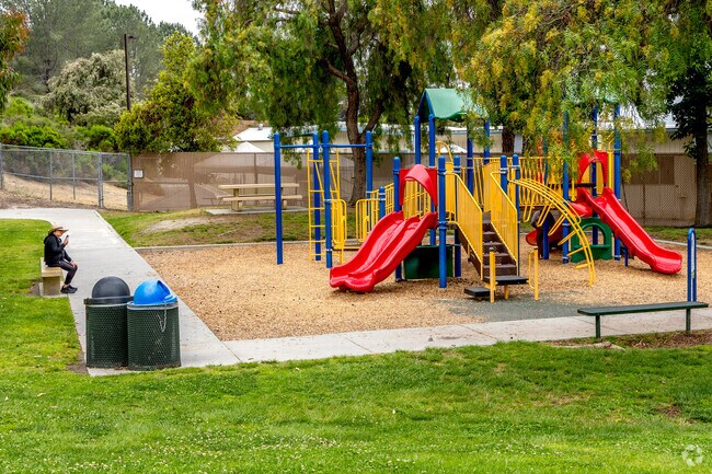 Alamosa Park offers playgrounds and shaded picnic spots.
