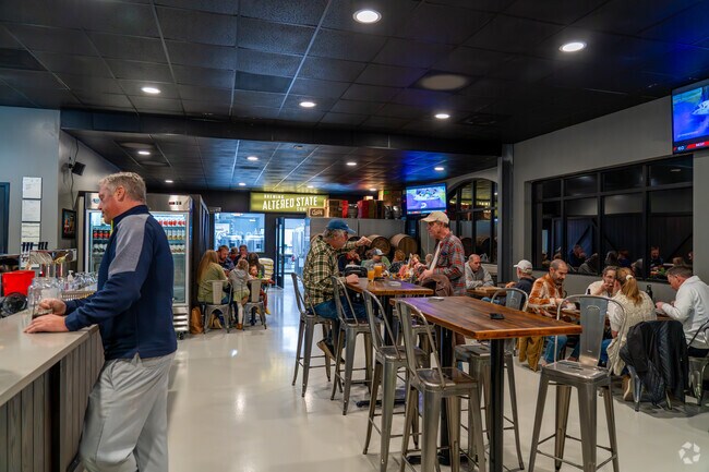 Falls Lake residents can catch a game at Altered State Brewing Company.