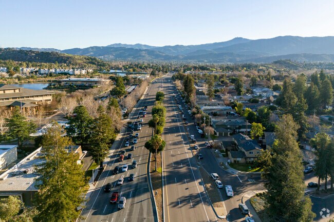 The neighborhood is surrounded by lush greenery and offers a perfect balance of city and nature.