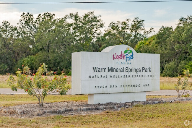 A welcome to Warm Mineral Springs Park sign can be found at park entrance.