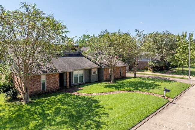 Good Earth residents enjoy manicured lawns.