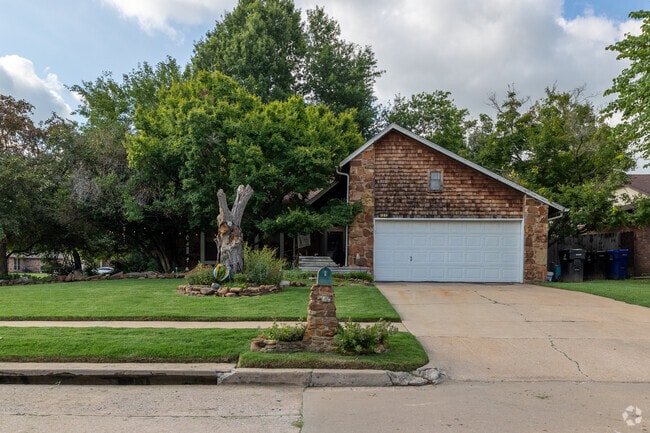 Wood siding offers this traditional style home in Silvertree a unique look.