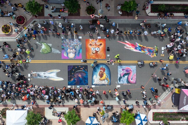 Several artists create thier art work on each block of Main Street.