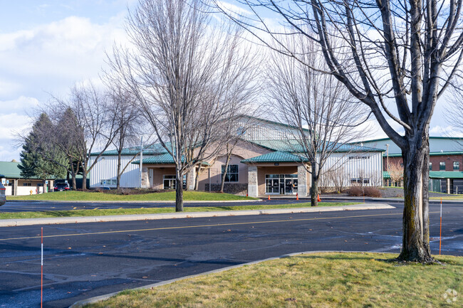 Genesis Preparatory Academy is located near other commercial businesses.