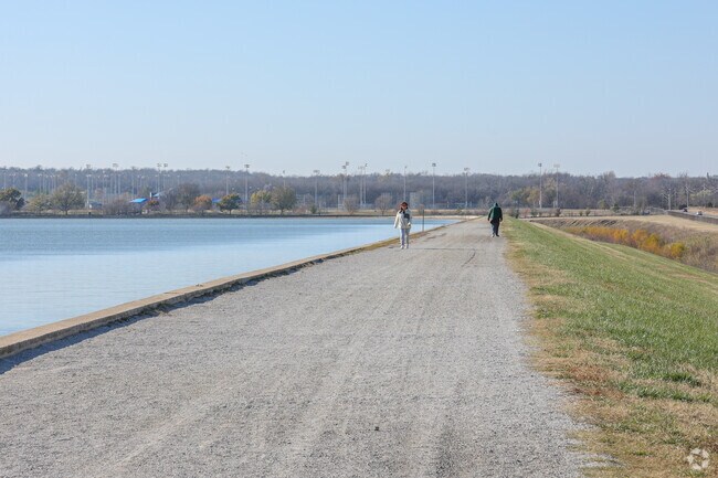 Walk the long gravel path around the Lynn Lane Reservoir near Eastpark.