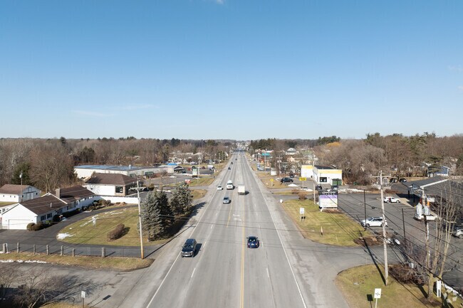 Route 9 cuts through Halfmoon as a thriving commercial corridor, connecting businesses with high visibility and easy access.