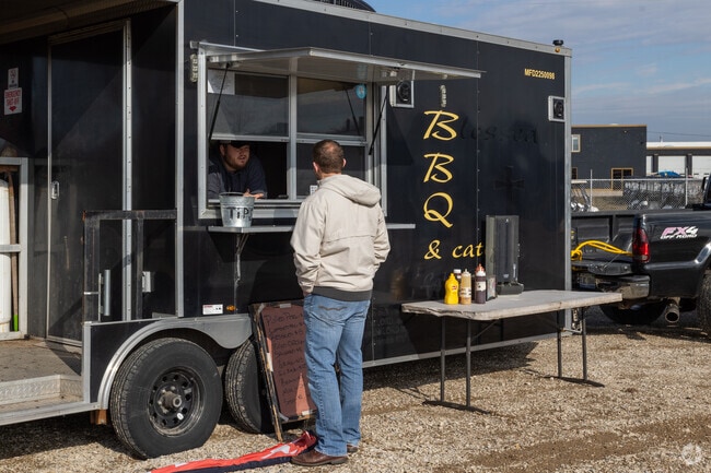 Outside Big O's Smokehouse they have several recurring food trucks by local owners from Caledonia Township.