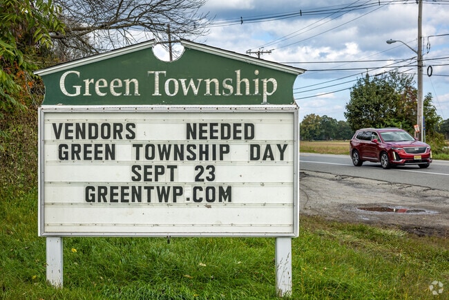 Welcome signage for Green Township provides information in the absence of a town crier.