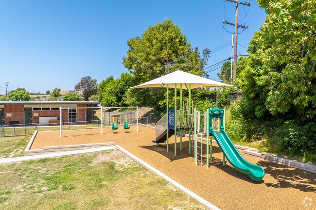 There are age approperate playground at Acacia Elementary School.