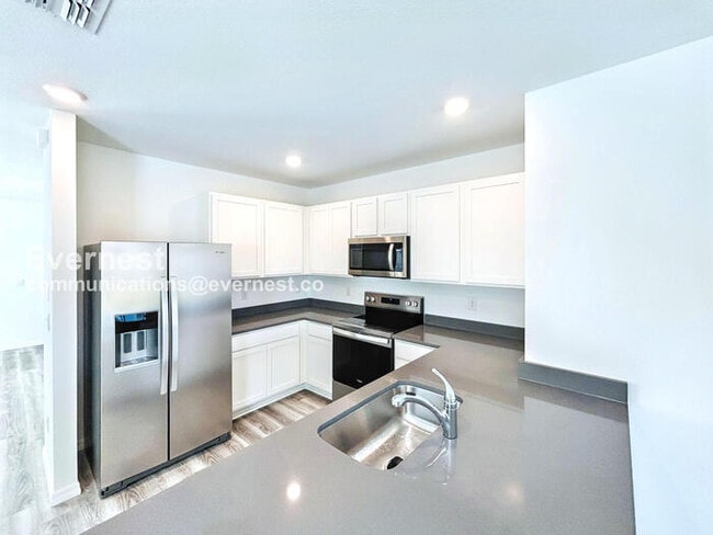 10650 Dusty Boot Rd, Land O' Lakes, FL 34638 - photo 7