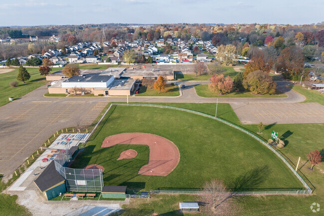 There is a baseball field adjacent to Ransom H. Barr Elementary School.