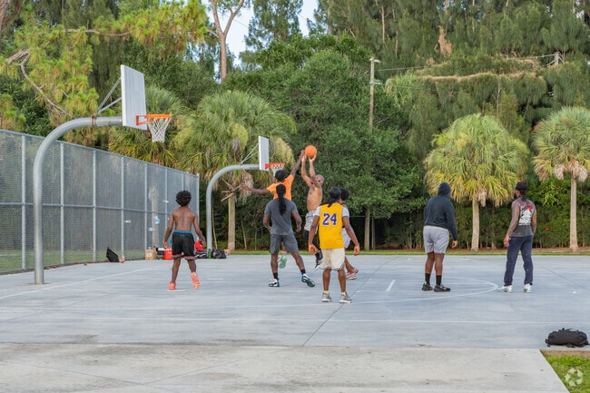 Basketball game underway at Haverhill Park near Lake Belvedere Estates.