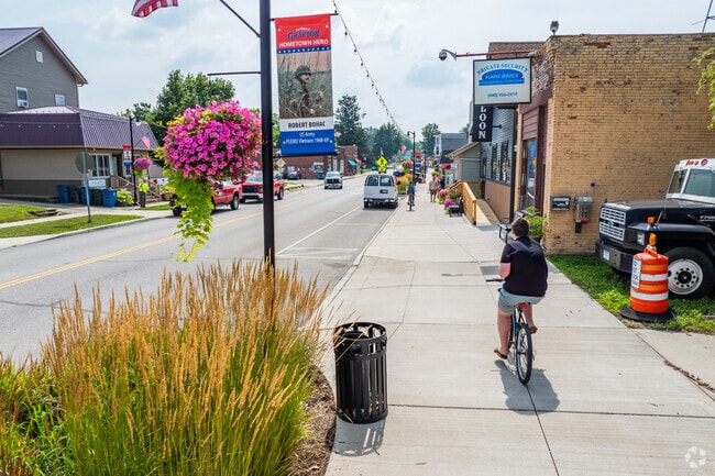 A tribute to service and sacrifice—Grafton’s Hometown Hero banners proudly honor local veterans and active-duty military members, celebrating their dedication along the heart of Main Street.
