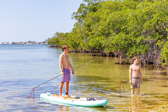Sewall's Point adventurous boys taking in some spearfishing at the River Cove Preserve.