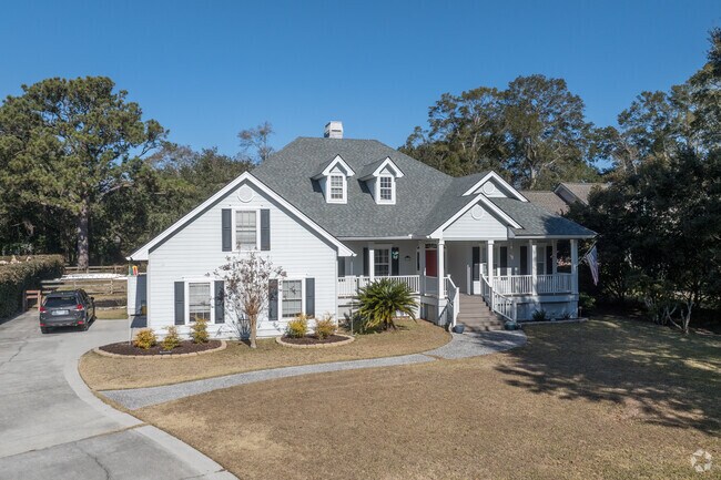 Many traditional homes feature gable roofs, large windows, and detailed trim.