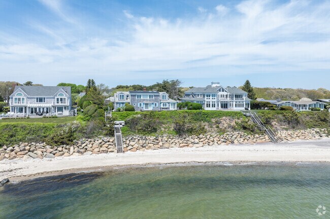 A row of homes sits atop the bluffs of Northwest Harwich overlooking Nantucket Sound.