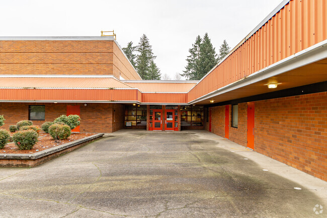 The office entrance is centrally located at the Burnt Bridge Creek Elementary School.