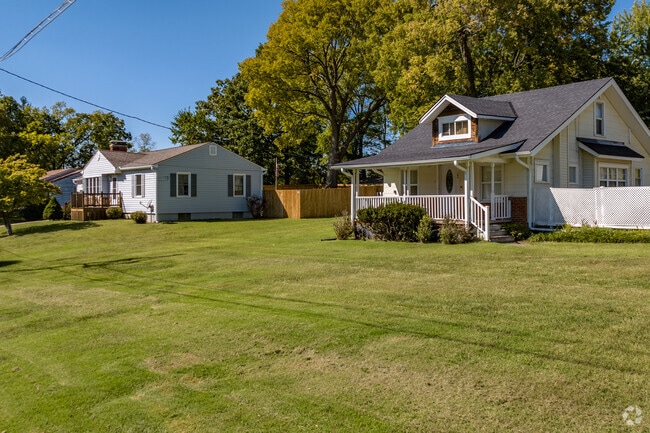 Large yards surround many smaller homes in Claycomo neighborhoods.