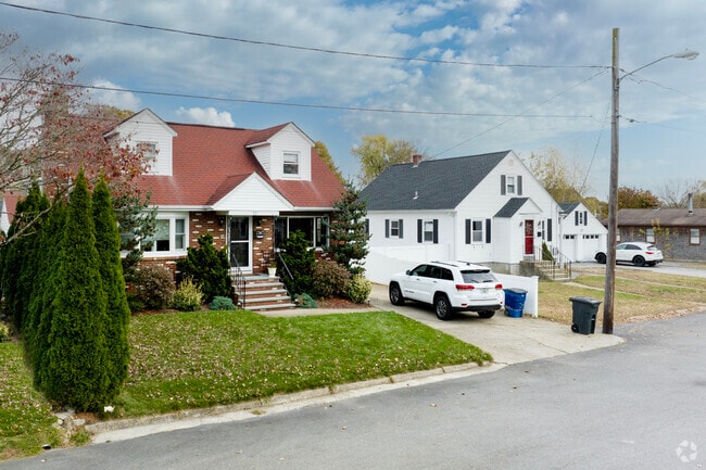 Colonial homes in Thorton sit in neat rows next to their neighbors on quiet streets.