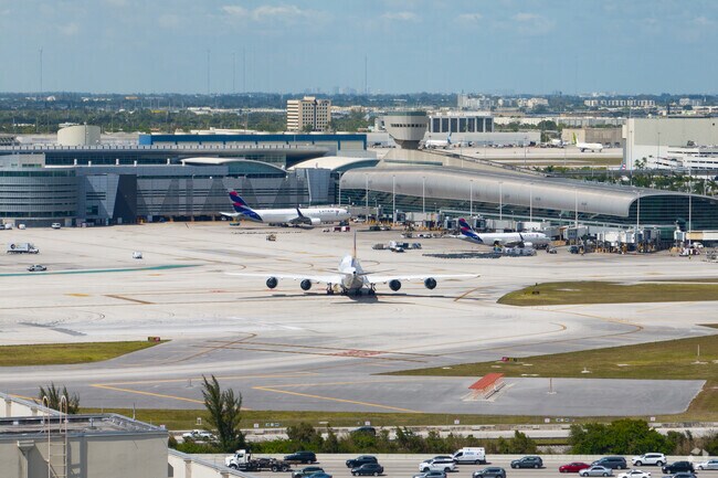 Miami International Airport is about 14 miles from Key Biscayne via the causeway.