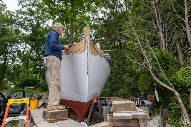 Boat repairs are a common sight in Cohasset’s active harbor community.