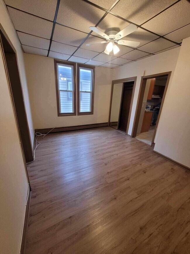 living room - connected to entrance, bedrooms, and kitchen