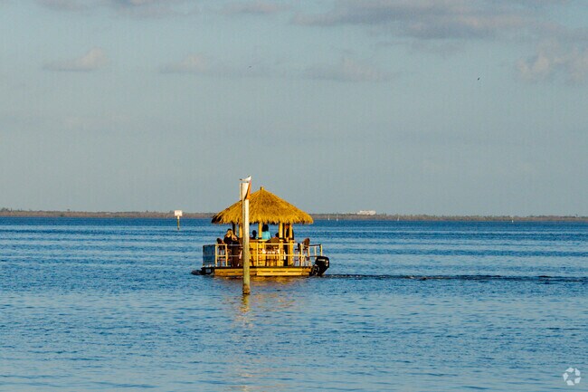Tiki boat bar tours offer a unique sunset experience in North Captiva Island.