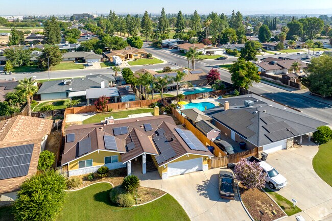 Solar panels are common on homes, saving residents on energy bills.