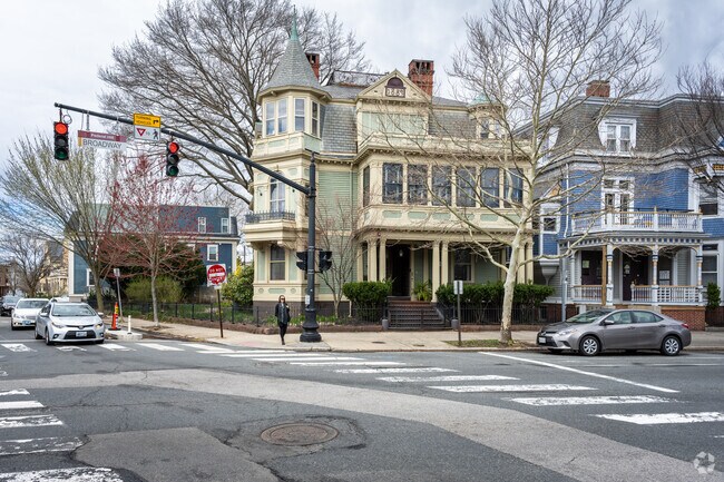 Stroll along Broadway St., Providence, to admire the timeless elegance of Victorian homes.