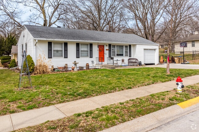 Ranch-style homes with curb appeal line the streets of the Cooley Highlands neighborhood.