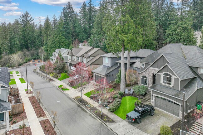 Tall pine and maple trees shade the residential streets of Metzger.