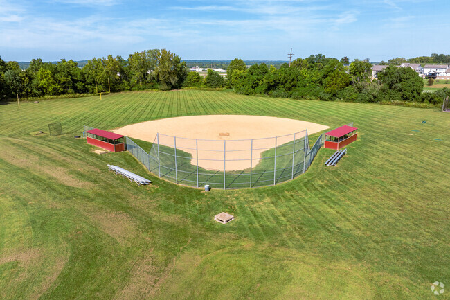 Zoomed shot of baseball diamond at the back of the school of Barat Academy.