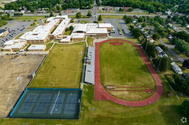 Students enjoy the large sports field at West Genesee Senior High School.