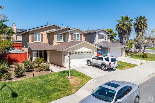 New development includes two story homes with attached garages.