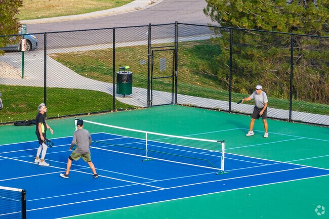 Test your pickleball skills with friends at the Dakota Station Park tennis courts in Charter.