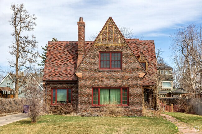 Brick Tudor homes near Regis reflect Denver’s historic character.