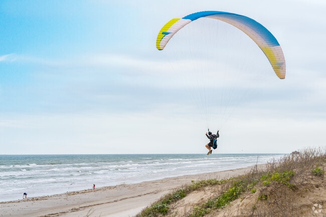 The City of Corpus Christi paragliders frequent Padre Beach located just 10 minutes away from Flour Bluff.