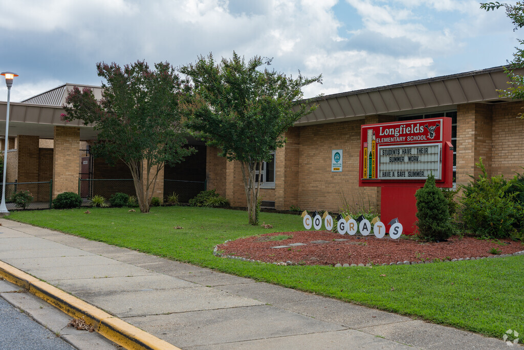 Longfields Elementary School sign and building in Forestville.