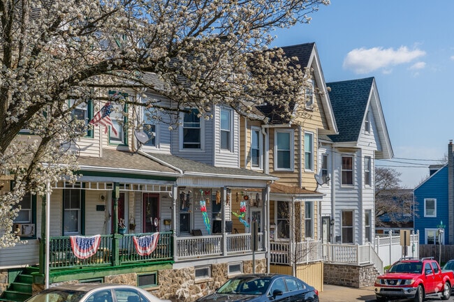 Colorful flowers accompany beautiful Victorian-style city homes in West Ward.